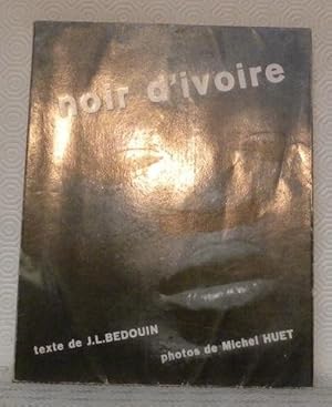 Image du vendeur pour Noir d'ivoire. Photos de Michel Huet. mis en vente par Bouquinerie du Varis