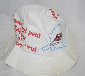 Cloth hat imprinted with the slogan; "N'Importe qui peut l'attraper, tout le monde peut l'eviter"...