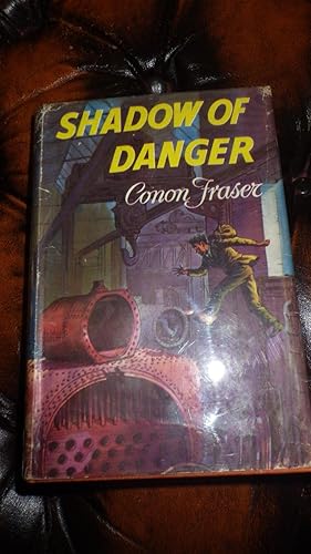 Immagine del venditore per Shadow of Danger , Boys Library, in Color Dustjacket of Man in Green Suit & shoes Jumping in Mid Air near Large Purple & Red Pipes & Machinery, ERIC PERRY is set, by His Eccentric Uncle Trevor in Singapore, venduto da Bluff Park Rare Books