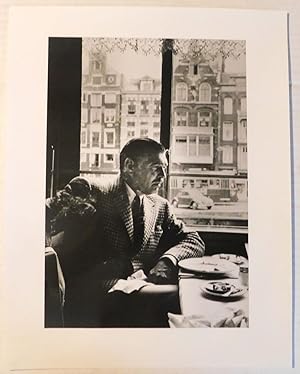 A BEAUTIFUL ORIGINAL PHOTOGRAPH OF CLARK GABLE SEATED AT A RESTAURANT'S WINDOW TABLE IN ARNHEM HO...