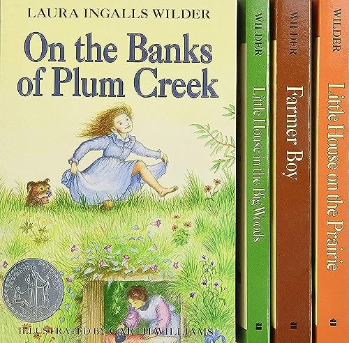 Stock image for Little House 4-Book Box Set: Little House in the Big Woods, Farmer Boy, Little House on the Prairie, On the Banks of Plum Creek for sale by Goodwill Books