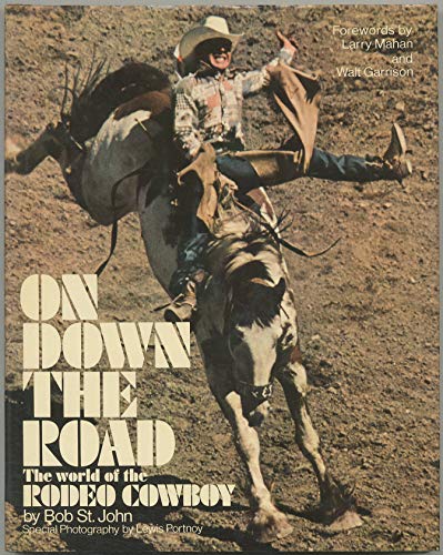 9780136372721: On down the road : the world of the rodeo cowboy / by Bob St. John ; forewords by Larry Mahan and Walt Garrison ; special photography by Lewis Portnoy ; designed by Allan Mogel