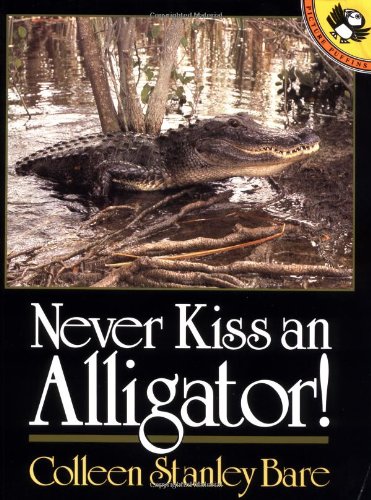 Beispielbild fr Never Kiss an Alligator! (Picture Puffin Books) zum Verkauf von SecondSale