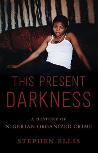 Stock image for This Present Darkness : A History of Nigerian Organized Crime for sale by Better World Books: West