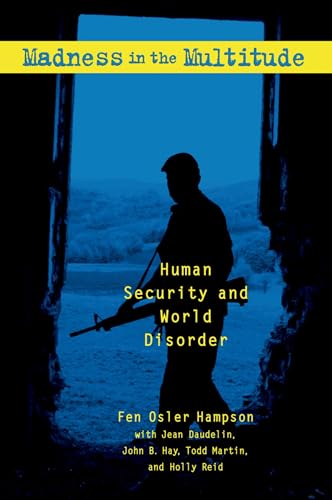 Imagen de archivo de Madness in the Multitude: Human Security and World Disorder a la venta por Zoom Books Company