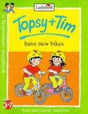 9780216931343: Topsy + Tim Ride Their Bikes