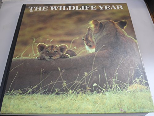 Imagen de archivo de The Wildlife Year: Life Cycles of Nature Around the World a la venta por Wonder Book