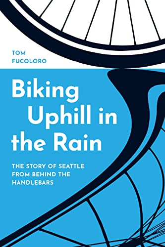 Beispielbild fr Biking Uphill in the Rain - The Story of Seattle from behind the Handlebars zum Verkauf von PBShop.store US