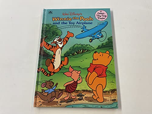 Walt Disney's Winnie the Pooh and the Toy Airplane (Golden Very Easy Reader) (9780307115867) by Phillips, Joan; Langley, Bill; Schroeder, Russell