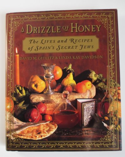 Beispielbild fr A Drizzle of Honey : The Lives and Recipes of Spain's Secret Jews zum Verkauf von POQUETTE'S BOOKS