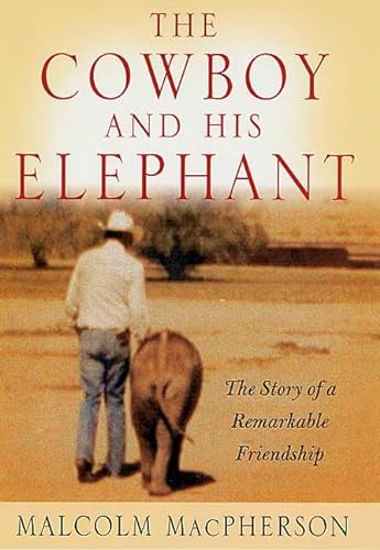 Imagen de archivo de The Cowboy and His Elephant: The Story of a Remarkable Friendship a la venta por ZBK Books