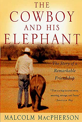 Imagen de archivo de The Cowboy and His Elephant: The Story of a Remarkable Friendship a la venta por BooksRun