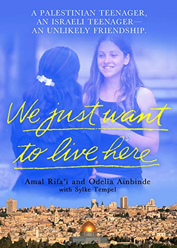 9780312318949: WE JUST WANT TO LIVE HERE: A Palestinian Teenager, an Israeli Teenager, an Unlikely Friendship