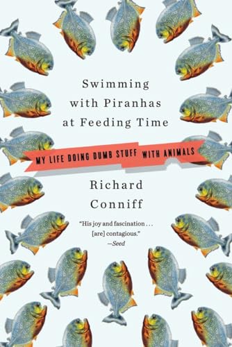 Stock image for Swimming with Piranhas at Feeding Time: My Life Doing Dumb Stuff with Animals for sale by Wonder Book