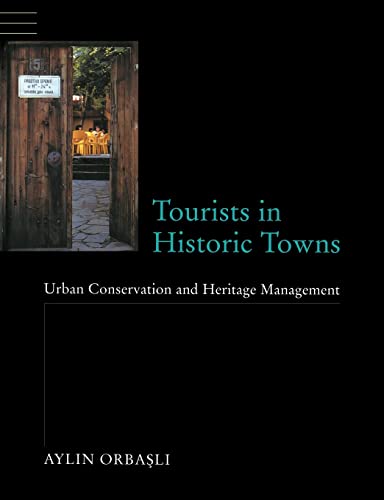 9780419259305: Tourists in Historic Towns: Urban Conservation and Heritage Management