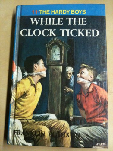 9780448189116: While the Clock Ticked (Hardy Boys Mystery Stories)