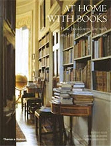 Stock image for AT HOME WITH BOOKS. HOW BOOKLOVERS LIVE WITH AND CARE FOR THEIR LIBRARIES. for sale by Nicola Wagner