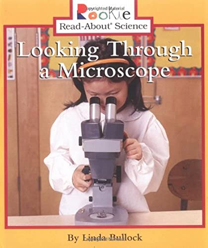 Stock image for Looking Through a Microscope (Rookie Read-About Science: Physical Science: Previous Editions) for sale by Better World Books