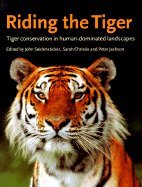 Stock image for Riding the Tiger: Tiger Conservation in Human-Dominated Landscapes for sale by AwesomeBooks
