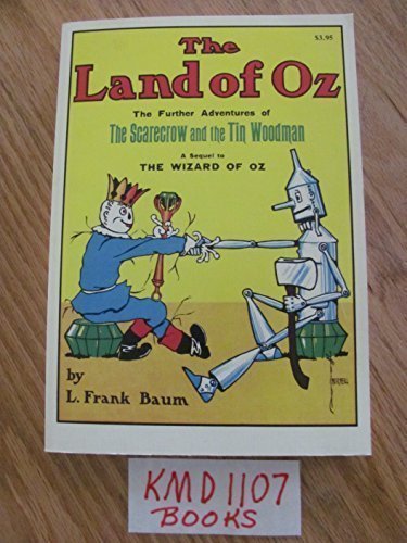 Beispielbild fr The Land of Oz: Being an Account of the Further Adventures of the Scarecrow and Tin Woodman and Also the Strange Experiences of the Highly Magnified zum Verkauf von Bookends