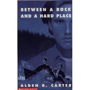 Imagen de archivo de Between a Rock and a Hard Place a la venta por BookHolders