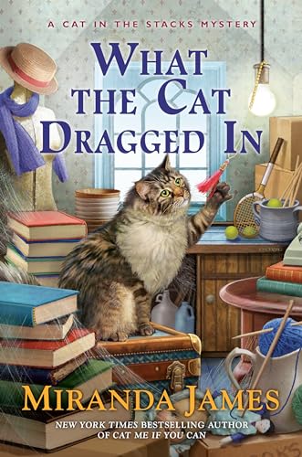 Beispielbild fr What the Cat Dragged In (Cat in the Stacks Mystery) zum Verkauf von Wonder Book