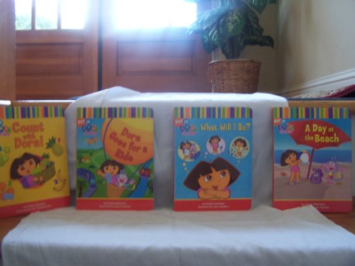 Stock image for Dora the Explorer: Dora's Box of Books (A Day at the Beach, Dora's Opposites, Count With Dora, A Surprise Party) (English and Spanish Edition) for sale by Patrico Books