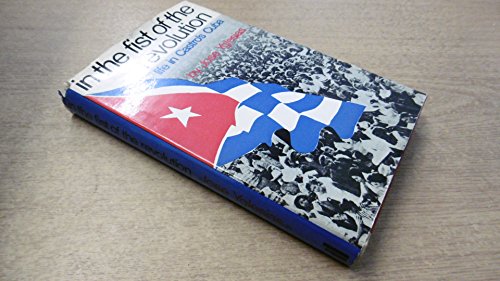 Stock image for In The Fist of the Revolution: Life In A Cuban Country Town for sale by GloryBe Books & Ephemera, LLC