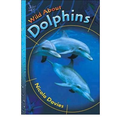 9780744589030: Wild About Dolphins