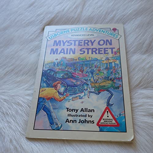 Beispielbild fr Mystery on Main Street (Usborne Puzzle Adventures, Advanced Level) zum Verkauf von Front Cover Books