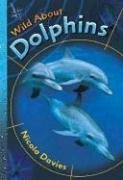 9780763614546: Wild About Dolphins