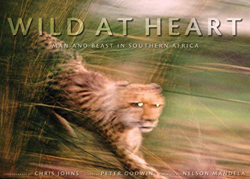 Wild at Heart: Man and Beast in Southern Africa [signed by Chris Johns]