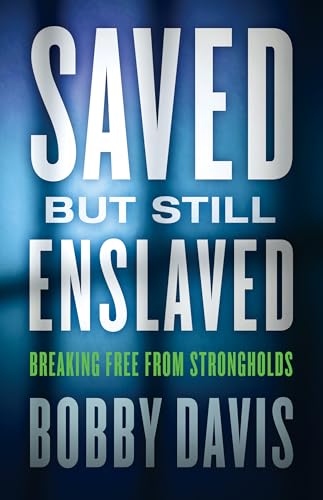 Imagen de archivo de Saved But Still Enslaved: Breaking Free from Strongholds a la venta por ThriftBooks-Reno