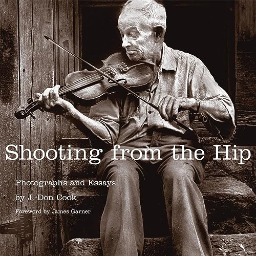 Imagen de archivo de Shooting from the Hip: Photographs and Essays a la venta por BooksRun