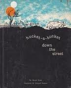Imagen de archivo de Hucket-A-Bucket Down the Street a la venta por Ergodebooks