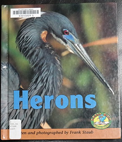 Stock image for Herons (Early Bird Nature) for sale by GuthrieBooks