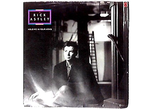 Imagen de archivo de Hold me in your arms Astley, Rick a la venta por LIVREAUTRESORSAS