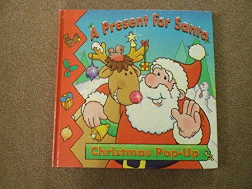 Imagen de archivo de A Present for Santa: Christmas Pop-up a la venta por Half Price Books Inc.