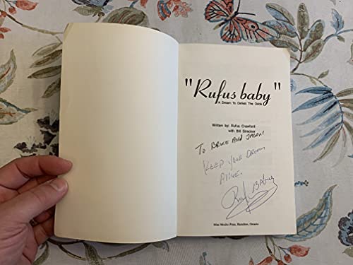 Stock image for Rufus Baby : A Dream to Defeat the Odds .(Signed and inscribed by Rufus Crawford ) for sale by Heroes Bookshop