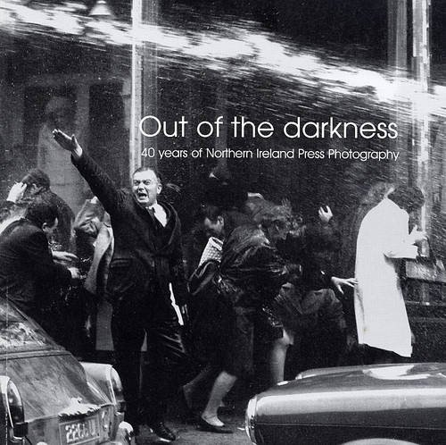 Stock image for Out of the Darkness: 40 Years of Northern Ireland Press Photography for sale by Phatpocket Limited