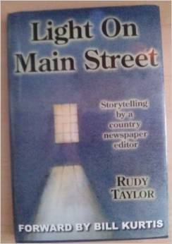 Imagen de archivo de Light on Main Street: Storytelling by a Country Newspaper Editor a la venta por Your Online Bookstore