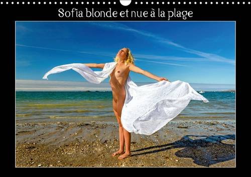 Stock image for Sofia blonde et nue a la plage 2016: Photos erotiques d'une jeune femme nue, blonde aux yeux bleus, nue, qui bronze et se prelasse sur une plage de sable et sur des rochers. (Calvendo Personnes) for sale by Revaluation Books