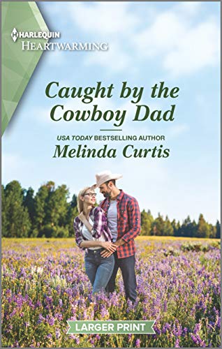 Stock image for Caught by the Cowboy Dad : A Clean Romance for sale by Better World Books