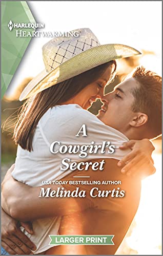 Beispielbild fr A Cowgirl's Secret: A Clean Romance (The Mountain Monroes, 9) zum Verkauf von Gulf Coast Books
