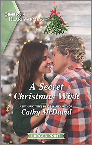Beispielbild fr A Secret Christmas Wish: A Clean Romance (Wishing Well Springs, 3) zum Verkauf von SecondSale