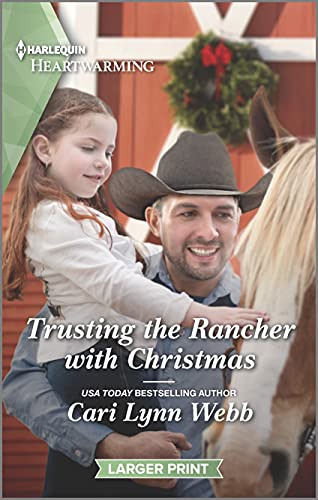 Stock image for Trusting the Rancher with Christmas: A Clean Romance (Three Springs, Texas, 2) for sale by SecondSale