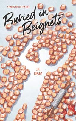 Stock image for Buried in Beignets (A Maggie Miller Mystery) for sale by Once Upon A Time Books