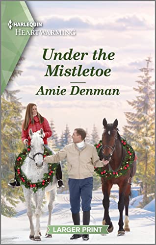Beispielbild fr Under the Mistletoe: A Clean and Uplifting Romance (Return to Christmas Island, 5) zum Verkauf von Off The Shelf