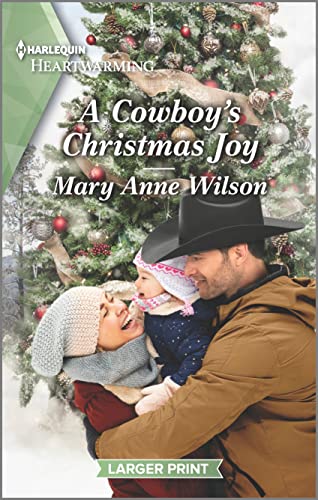 Stock image for A Cowboy's Christmas Joy: A Clean and Uplifting Romance for sale by ThriftBooks-Dallas