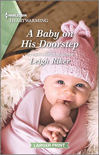 Stock image for A Baby on His Doorstep: A Clean and Uplifting Romance (Kansas Cowboys, 11) for sale by Bookmonger.Ltd